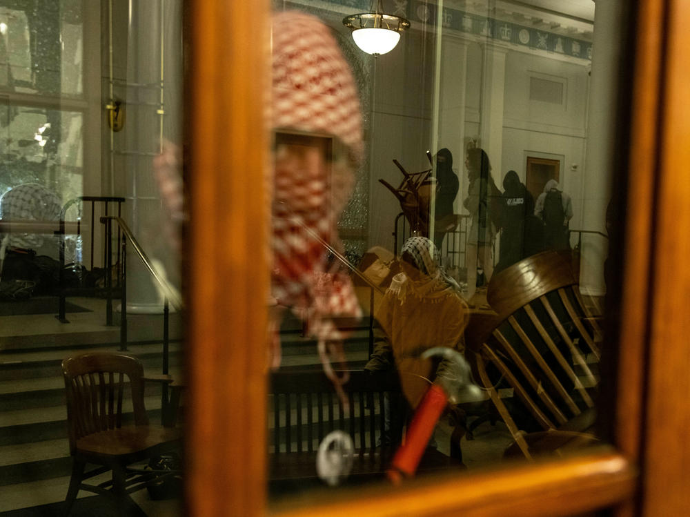 Demonstrators supporting Palestinians in Gaza barricade themselves inside Hamilton Hall on the Columbia University campus on April 30, 56 years after protesters occupied the same building in 1968.