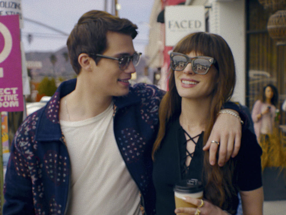 Nicholas Galitzine and Anne Hathaway in <em>The Idea of You</em>.