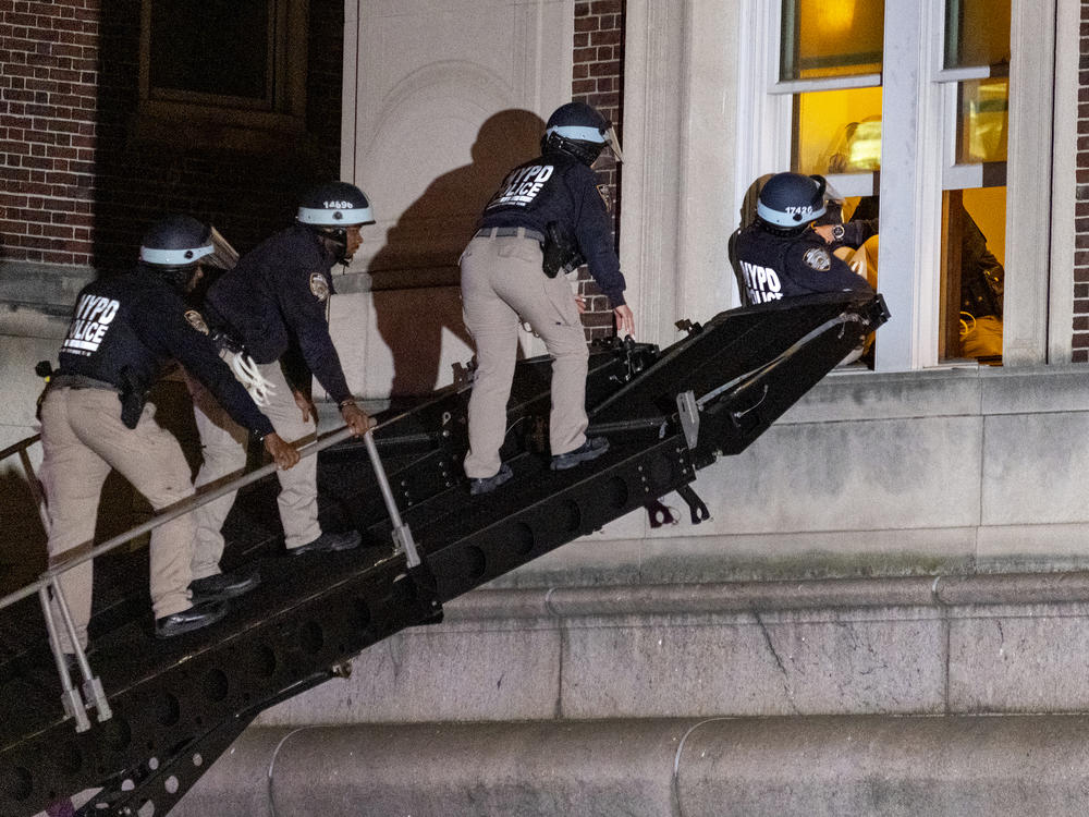 Using a tactical vehicle, New York City police enter an upper floor of Hamilton Hall on the Columbia University campus in New York on Tuesday, after protesters took over the building earlier in the day.