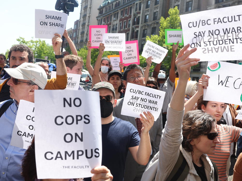 Columbia University professors demonstrate outside the Columbia campus demanding the release of students. Hundreds of people were arrested at pro-Palestinian protests on US campuses as police on May 1 extended a crackdown that included clearing out demonstrators occupying a building at Columbia University in New York.