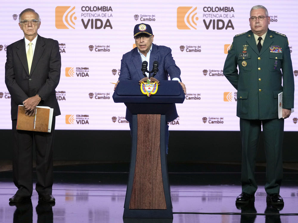 Colombia's President Gustavo Petro speaks during a press conference flanked by Colombia's Defense Minister Ivan Velasquez, left, and Colombia's Armed Forces Commander, Gen. Helder Giraldo, at the Narino Presidential Palace in Bogota, Colombia, on Tuesday.