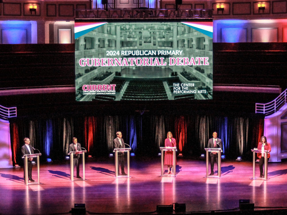 GOP Indiana gubernatorial candidates Mike Braun, Brad Chambers, Suzanne Crouch, Eric Doden, Curtis Hill and Jamie Reitenour debate during a forum on March 11, 2024.