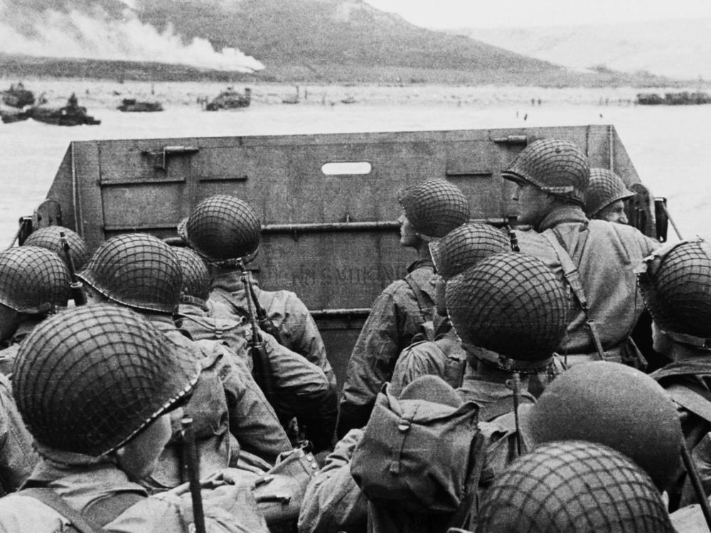 American soldiers huddle inside a landing craft approaching Utah Beach during the Allied invasion of Normandy, France, on D-Day.