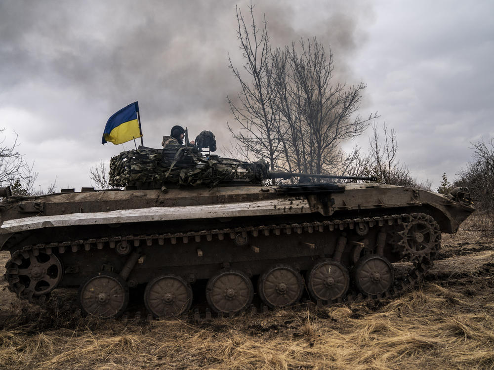 Ukrainian tank-men are seen on a BWP infantry fighting vehicle prepare for combat as the war between Russia and Ukraine continues in the direction of Lyman in Donetsk Oblast, Ukraine on March 17, 2024.