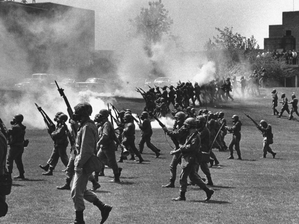 Ohio National Guard members towards students at Kent State University in Kent, Ohio, on May 4, 1970. They fired into the crowd, killing four students and injuring nine.