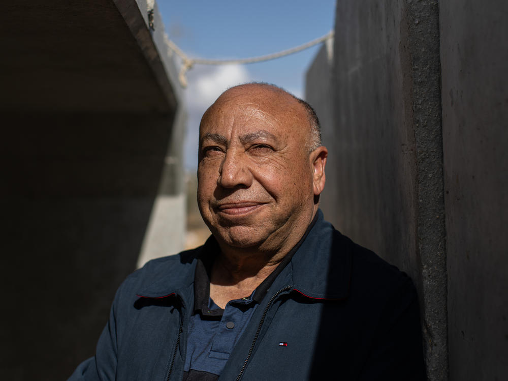 Kher Albaz, chairman of the board of AJEEC, an organization promoting Arab-Jewish equality and cooperation in the Negev Desert, stands in a concrete shelter in the unrecognized Bedouin village of Wadi al-Na'am in southern Israel.