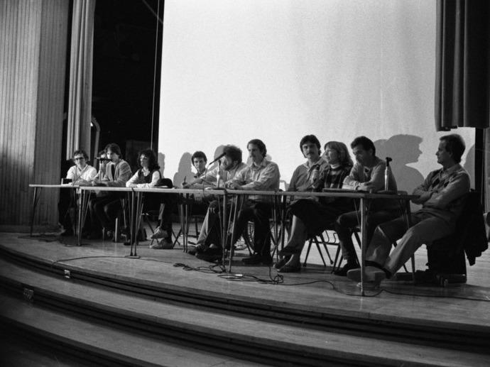 Alan and Chic Canfora, among others, take place in a panel discussion during the 15th Annual May 4 Commemoration in 1985.