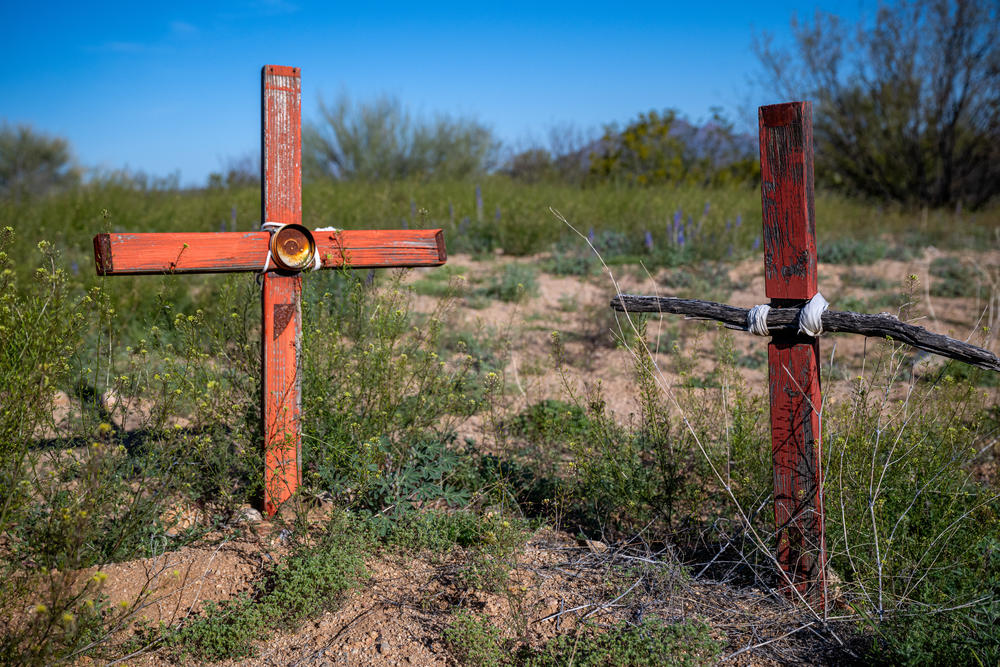 Álvaro Enciso places crosses at sites where migrants are known to have died in the borderland, these two are on a hill just a couple miles south of Three Points, Arizona on Wednesday, March 27, 2024.