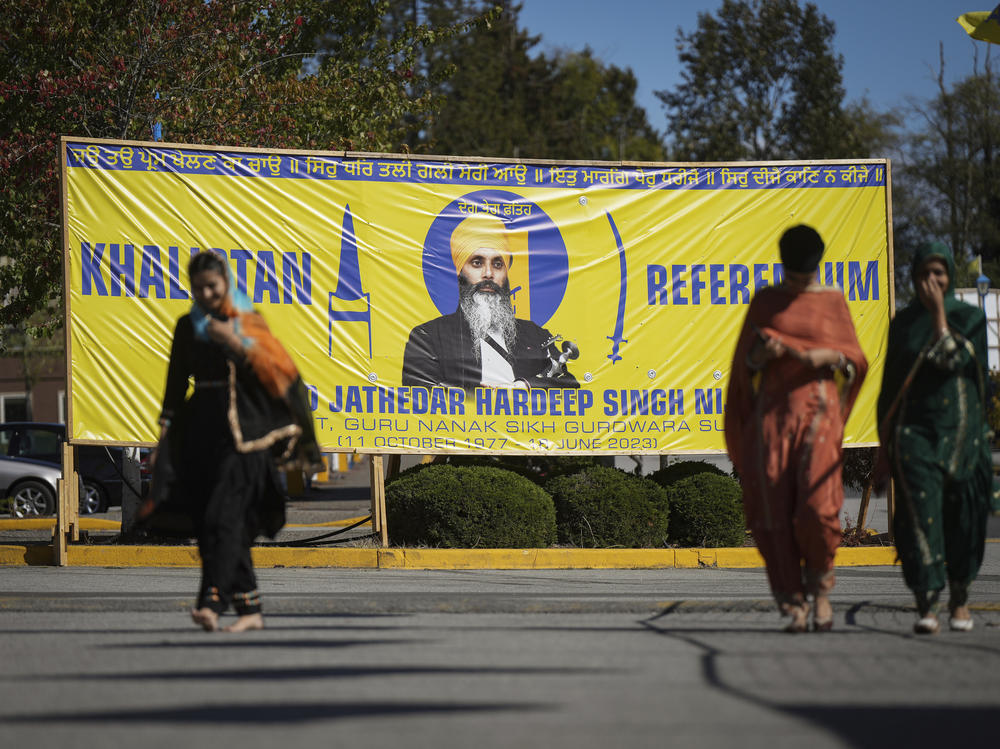 A banner that shows the late Sikh separatist leader Hardeep Singh Nijjar is displayed outside the Guru Nanak Sikh Gurdwara Sahib in Surrey, British Columbia, on Sept. 18, 2023.