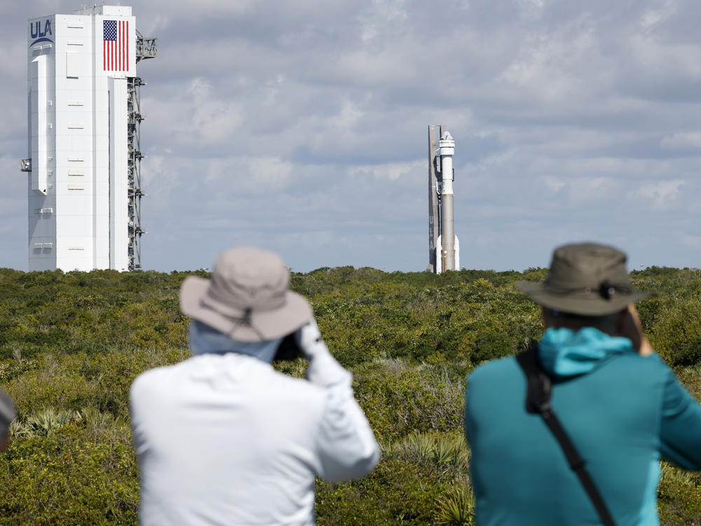 Photographers capture the Boeing Starliner capsule atop an Atlas V rocket as it is rolled out to the launch pad at Space Launch Complex 41, Saturday, May 4, 2024, in Cape Canaveral, Fla.