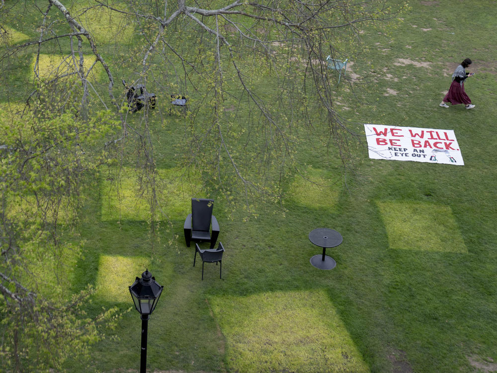 Squares mark a lawn where tents once stood at Brown University in Providence, R.I. It's one of several schools where administrators have struck deals with student protesters.