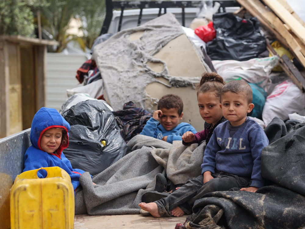 Displaced Palestinians in Rafah in the southern Gaza Strip pack their belongings following an evacuation order by the Israeli army on Monday amid the ongoing conflict between Israel and the Palestinian Hamas movement.