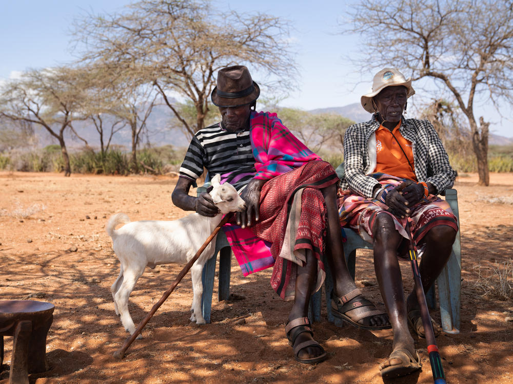Lengees (left) and Kinati Letadow. During their youth they were in the same group of morans. Six decades later, they still meet up every morning — within sight of the tree where they were circumcised in their moran initiation rite.