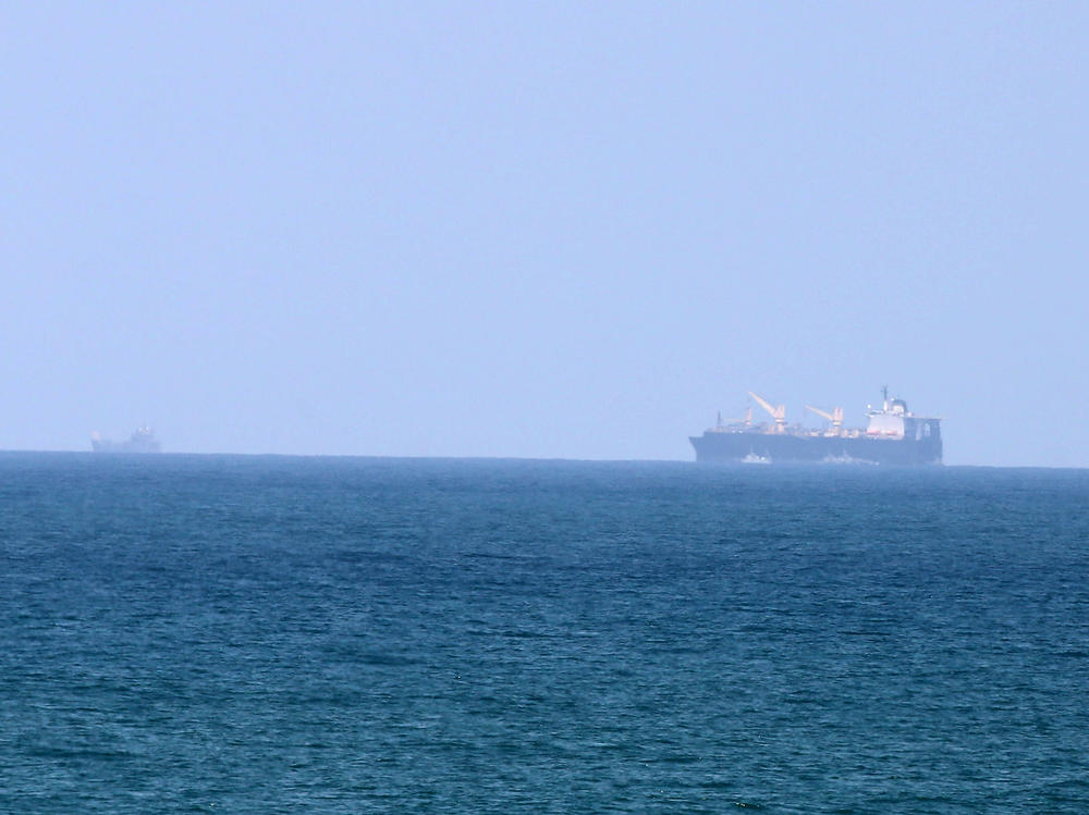 A U.S. Navy ship docks off the coast of the Gaza Valley area in the central Gaza Strip on April 29, 2024. The ship is expected to participate in the construction work of a floating naval dock to deliver more humanitarian aid to Gaza Strip  announced in March.