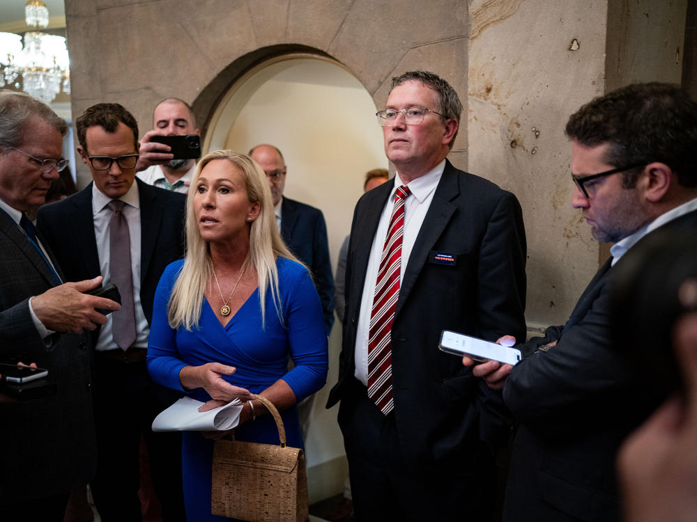 Rep. Marjorie Taylor Greene and Rep. Thomas Massie are seen here arriving for a meeting with Speaker of the House Mike Johnson on May 7.