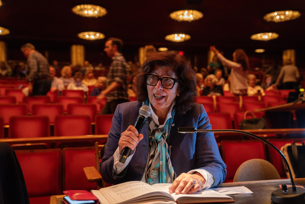 Washington National Opera artistic director Francesca Zambello, who also directs its production of <em>Turandot</em>, takes her place at the production table ahead of the dress rehearsal.