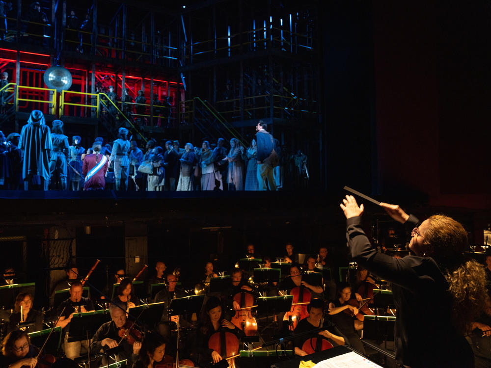 Speranza Scappucci conducts singers on stage and the orchestra in the pit for the Washington National Opera's production of <em>Turandot</em>.