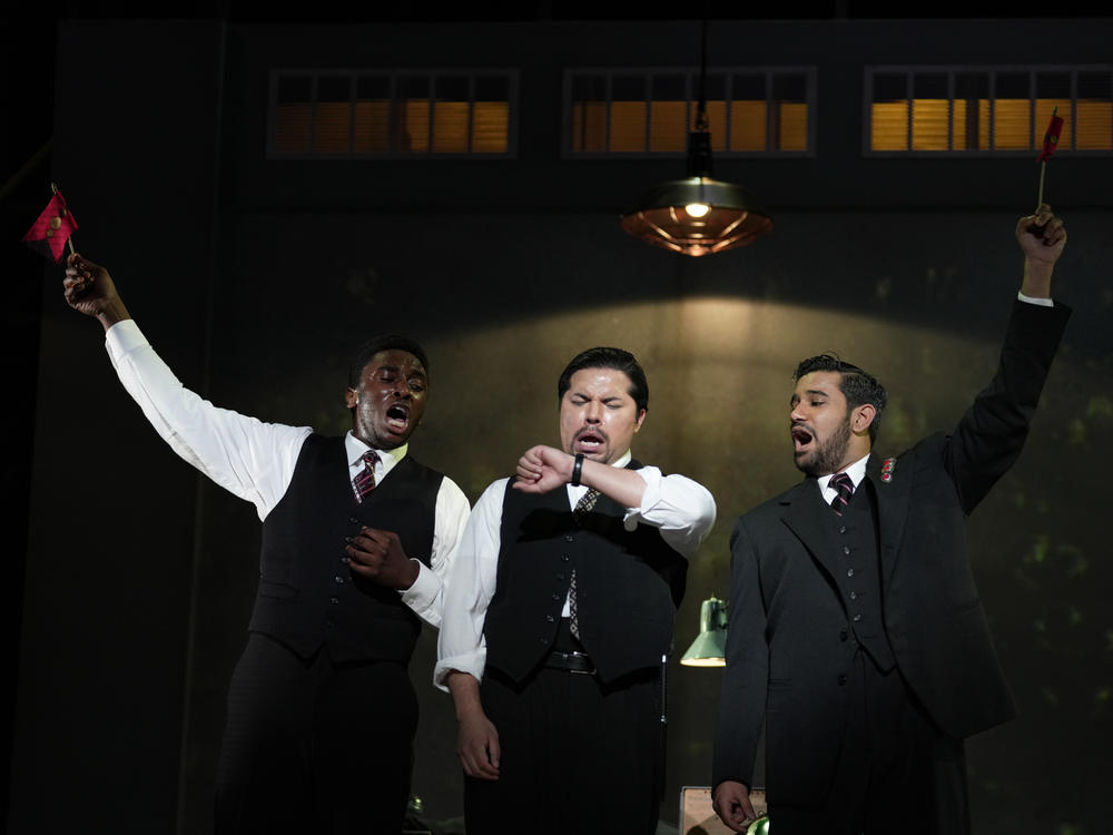 The WNO production called the characters Ping, Pang and Pong by their ministerial titles instead (R to L): Chancellor (Ethan Vincent), Majordomo (Sahel Salam) and Head Chef (Jonathan Rhodes).