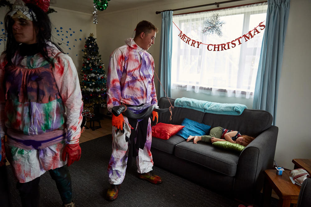 Kieran Glass (left) waits for a drink while Tristan Glass checks on Jake Swain, who is fast asleep. Most children are terrified of the Okalolies and will cry or hide when they approach. Jake, however, was utterly unimpressed and slept through most of the day.