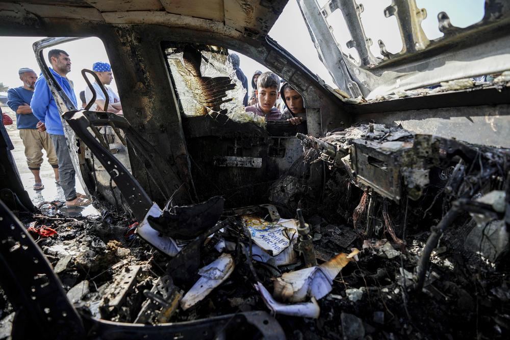 On April 2, people inspect the site where World Central Kitchen employees were killed in Deir al-Balah, Gaza Strip. World Central Kitchen, the food charity founded by chef José Andrés, called a halt to its work in the Gaza Strip after an Israeli strike killed seven of its workers on April 1.