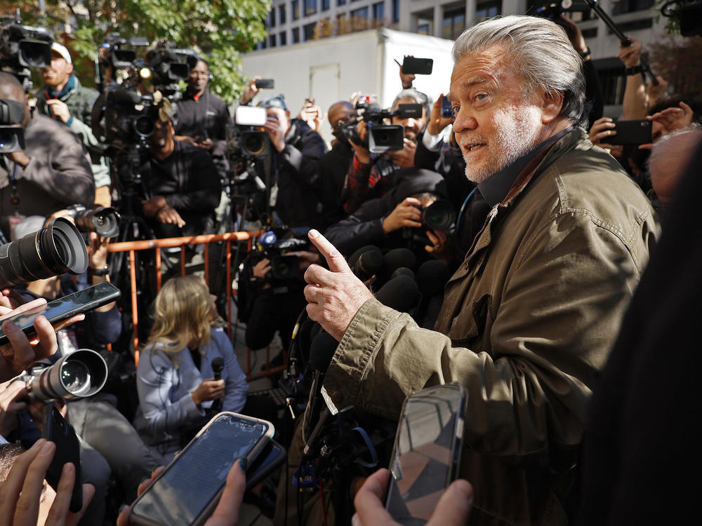 Former Trump White House senior adviser Stephen Bannon speaks to journalists after leaving federal court in Washington, D.C., after being sentenced in 2022. Bannon was sentenced to four months in prison after a federal jury found him guilty of two counts of contempt of Congress.