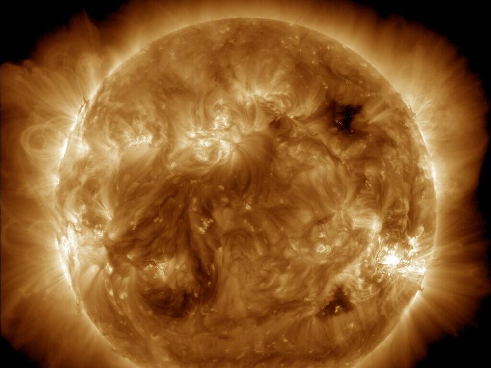 NASA's Solar Dynamics Observatory captured this image of solar flares early Saturday afternoon. The National Oceanic and Atmospheric Administration says there have been measurable effects and impacts from the geomagnetic storm.
