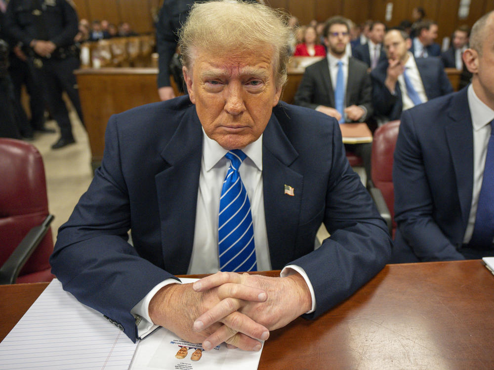 Former U.S. President Donald Trump and attorney Emil Bove attend his trial for allegedly covering up hush money payments at Manhattan Criminal Court on May 13, 2024 in New York City.
