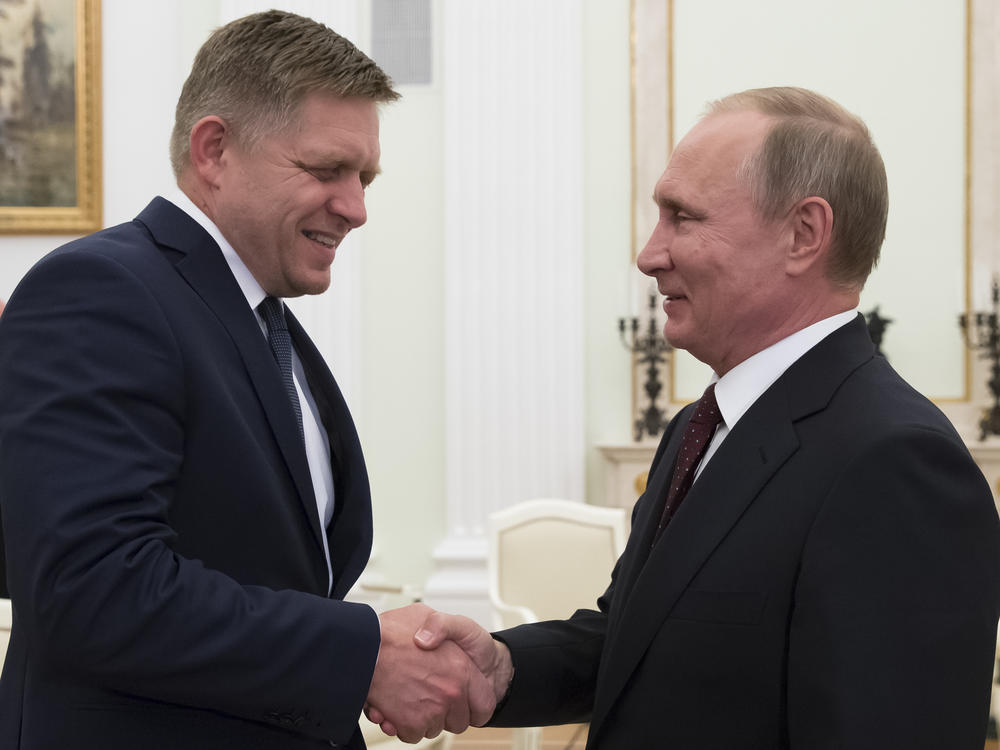 Russian President Vladimir Putin, right, shakes hands with Slovak Prime Minister Robert Fico during their meeting in the Kremlin in Moscow, Russia, on Aug. 25, 2016. Fico returned to power in Slovakia last year, having previously served twice as prime minister.