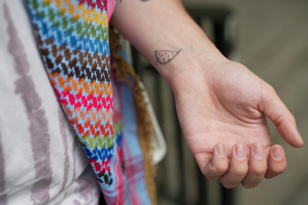 After being arrested inside Hamilton Hall, Columbia University graduate student Aidan Parisi got a tattoo — a watermelon slice — symbolizing Palestinian solidarity.