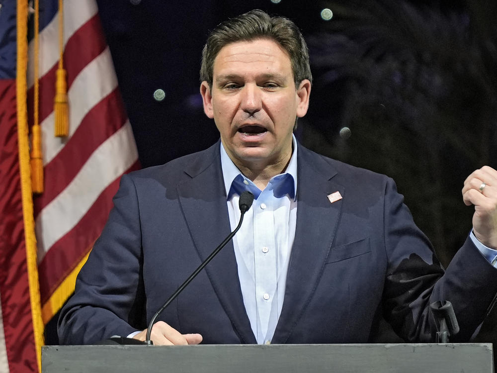 Florida Gov. Ron DeSantis speaks at a Feb. 8 luncheon in Tampa, Fla. Climate change will be a lesser priority in Florida and largely disappear from state statutes under legislation signed Wednesday by DeSantis.