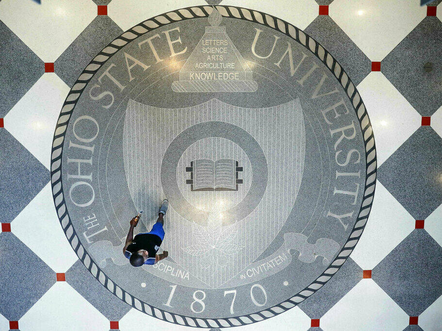 Pedestrians pass through The Ohio State University's student union.
