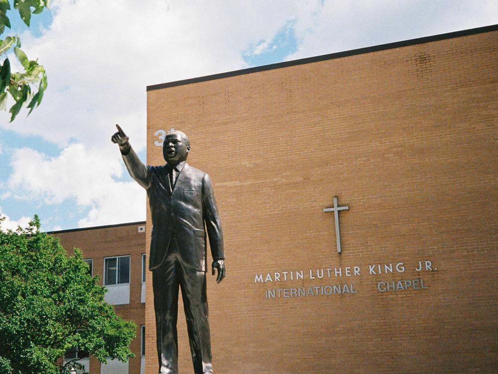 A statue of Dr. Martin Luther King Jr., Morehouse's most famous graduate, stands on campus in front of the chapel.