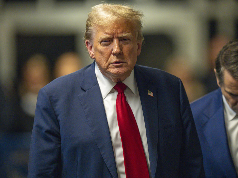 Former President Donald Trump speaks to the media after the day's proceedings in his criminal trial at Manhattan Criminal Court on Thursday in New York City.