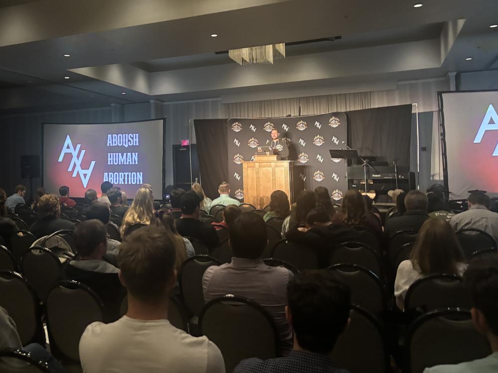 T. Russell Hunter of the anti-abortion group Abolitionists Rising speaks to activists in Charlotte, N.C. in April. Hunter favors charging abortion patients with homicide.