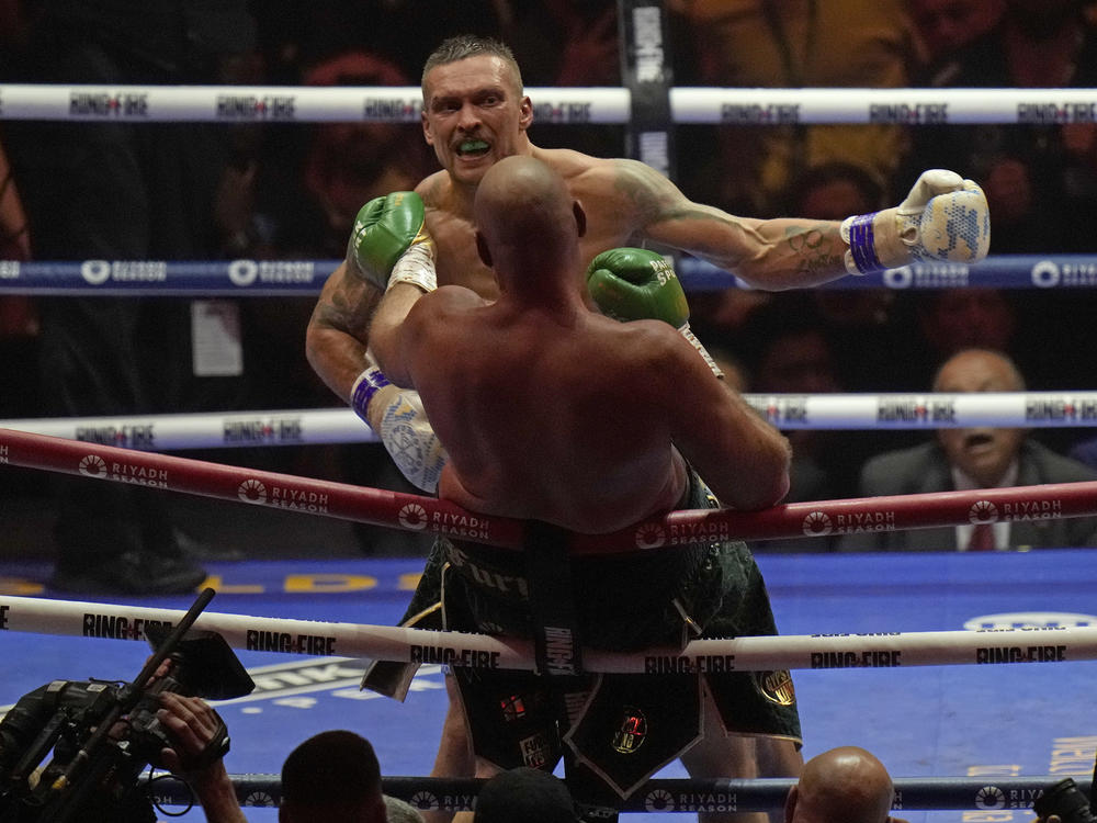 Ukraine's Oleksandr Usyk launches an attack on Britain's Tyson Fury during their undisputed heavyweight world championship boxing fight at the Kingdom Arena in Riyadh, Saudi Arabia, Sunday, May 19, 2024.