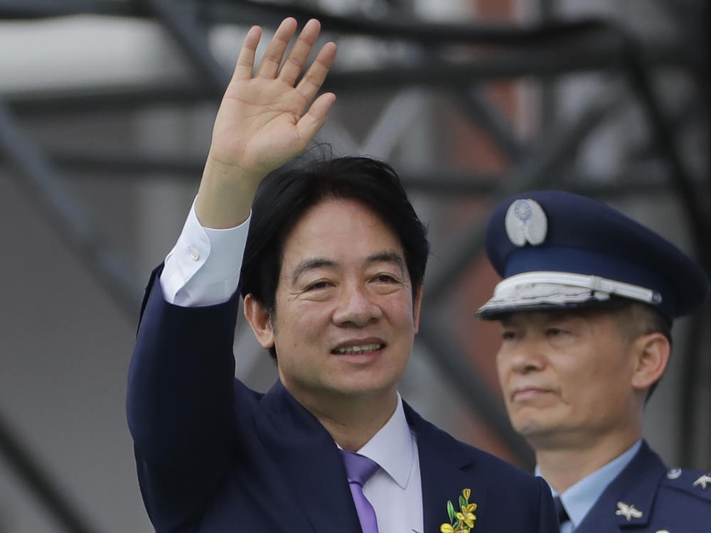 New Taiwan's President Lai Ching-te waves during Lai's inauguration ceremonies in Taipei, Taiwan, on Monday, May 20, 2024.