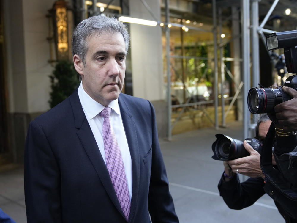 Michael Cohen leaves his apartment building on his way to Manhattan criminal court in New York on Monday.