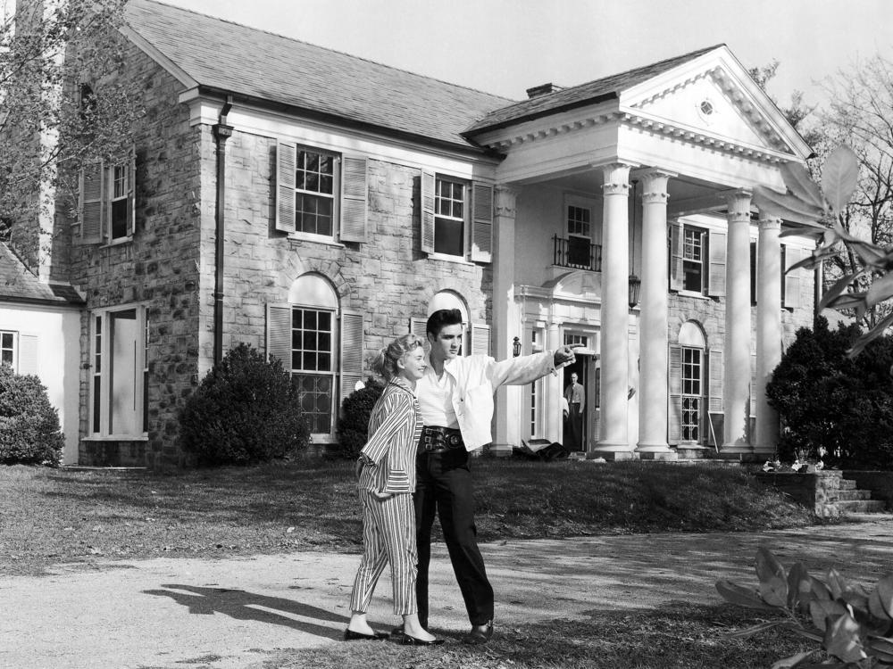 Elvis Presley pictured with then-girlfriend Yvonne Lime at his home Graceland in Memphis, Tennessee around 1957.