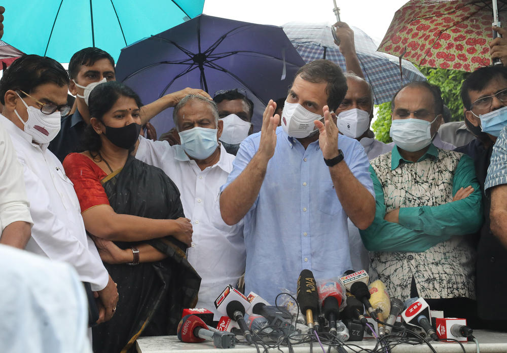 Congress party leader Rahul Gandhi, with leaders of opposition parties, addresses reporters on the Pegasus spyware project, outside the Parliament in New Delhi on July 28, 2021. Opposition parties asked whether the Indian government had bought Pegasus, a hacking software developed by the Israeli company NSO Group.