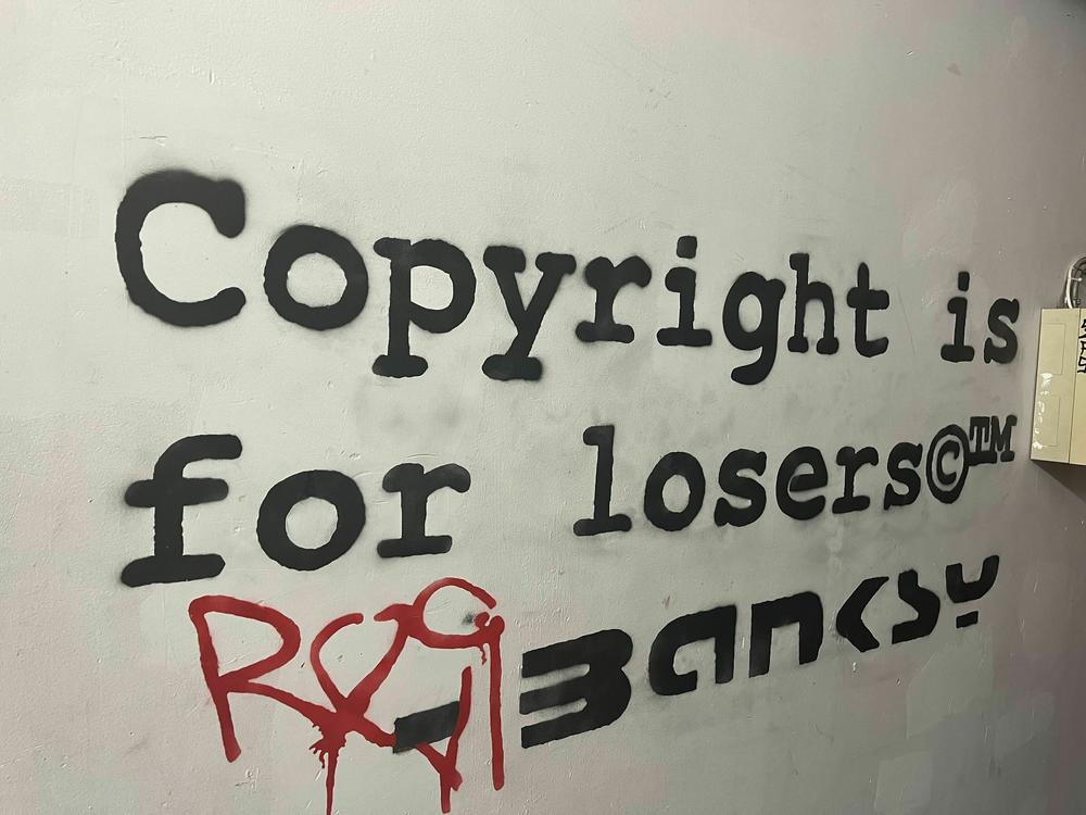 The museum put this quote, from Banksy's 2005 book <em>Wall and Piece</em>, in a stairwell.<br>
