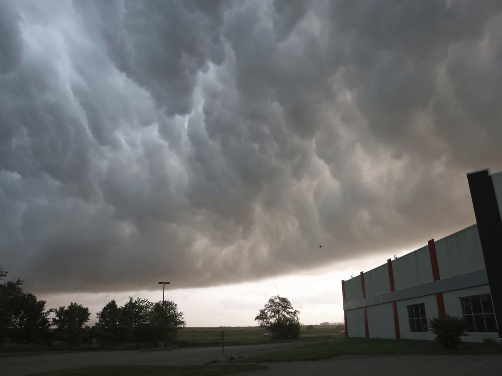 Severe storm clouds move across the northwest edge of Davenport, Iowa on Friday, May 24, 2024. Several tornadoes were reported in Iowa and Illinois as storms downed power lines and trees on Friday, just after a deadly twister devastated one small town.
