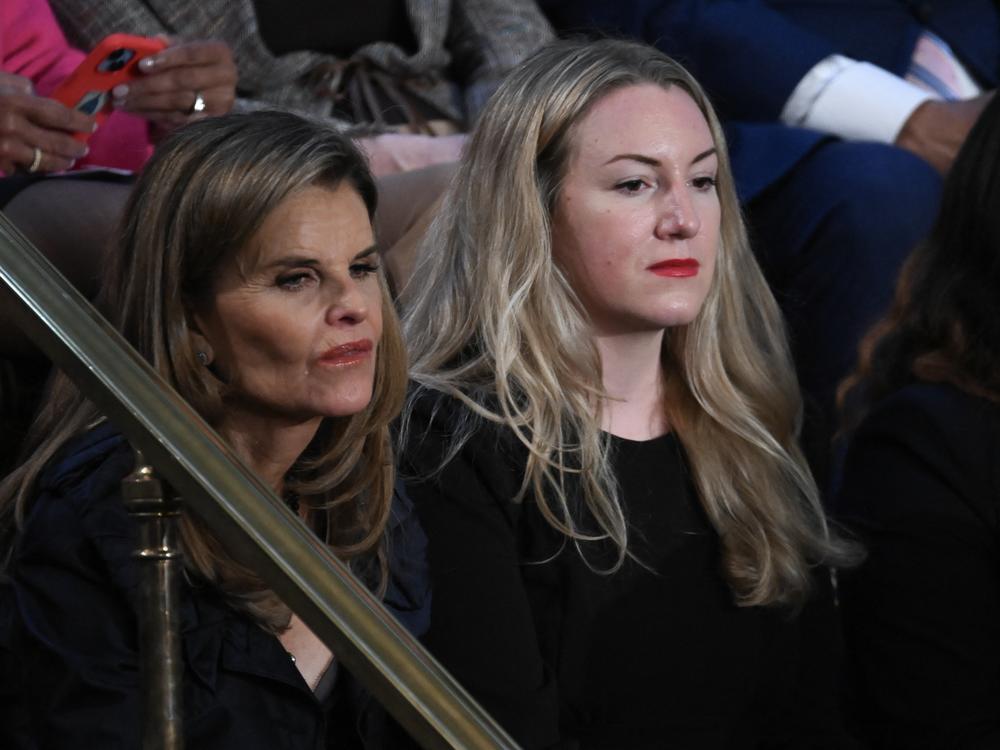 Kate Cox, right, attended the State of the Union address in March. She's seated next to Maria Shriver, the author and former First Lady of California. 