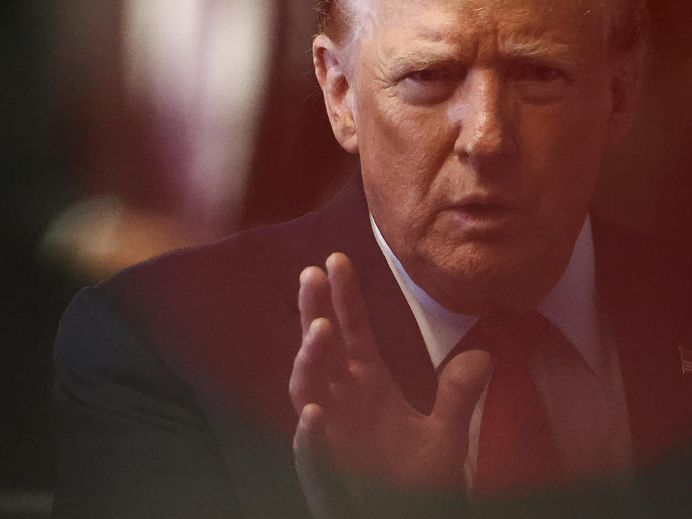 Former U.S. President Donald Trump speaks to the media as he arrives for his hush money trial at Manhattan Criminal Court on May 28, 2024 in New York City.