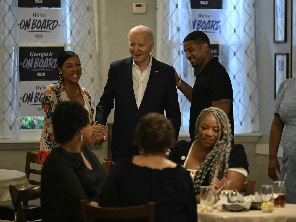 President Biden greets supporters and volunteers during a campaign event at Mary Mac's Tea Room in Atlanta on May 18. 