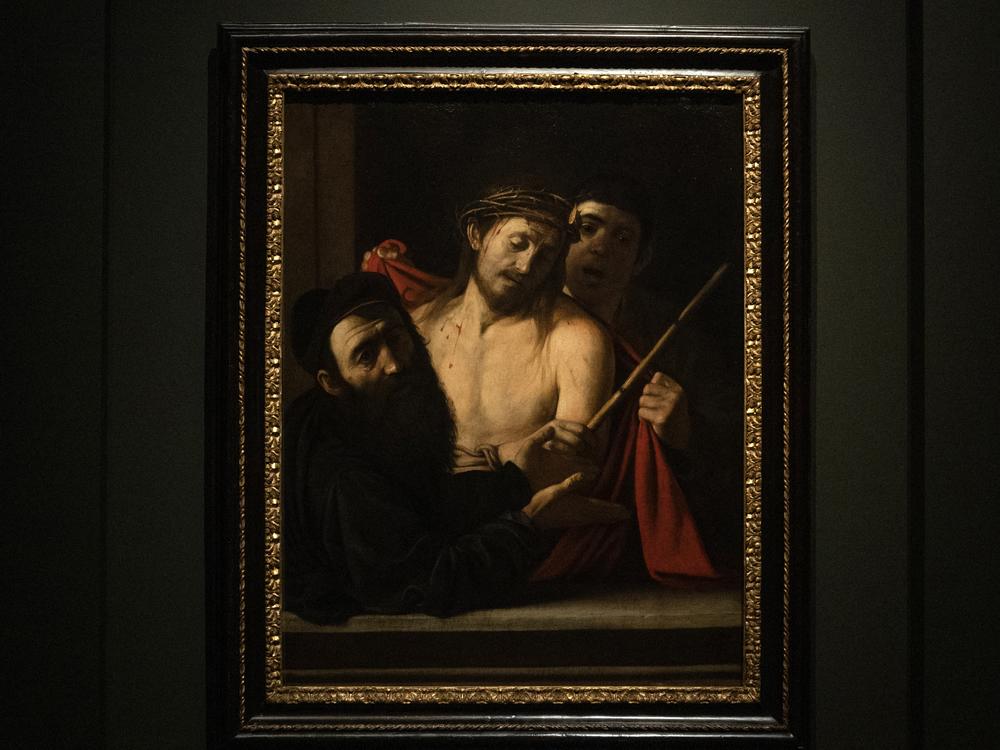 A Caravaggio painting entitled <em>Ecce Homo</em>, which was recently verified as a work of the Italian master after being mistakenly attributed to another artist, is pictured on display at the Prado museum in Madrid, Spain, on May 27.