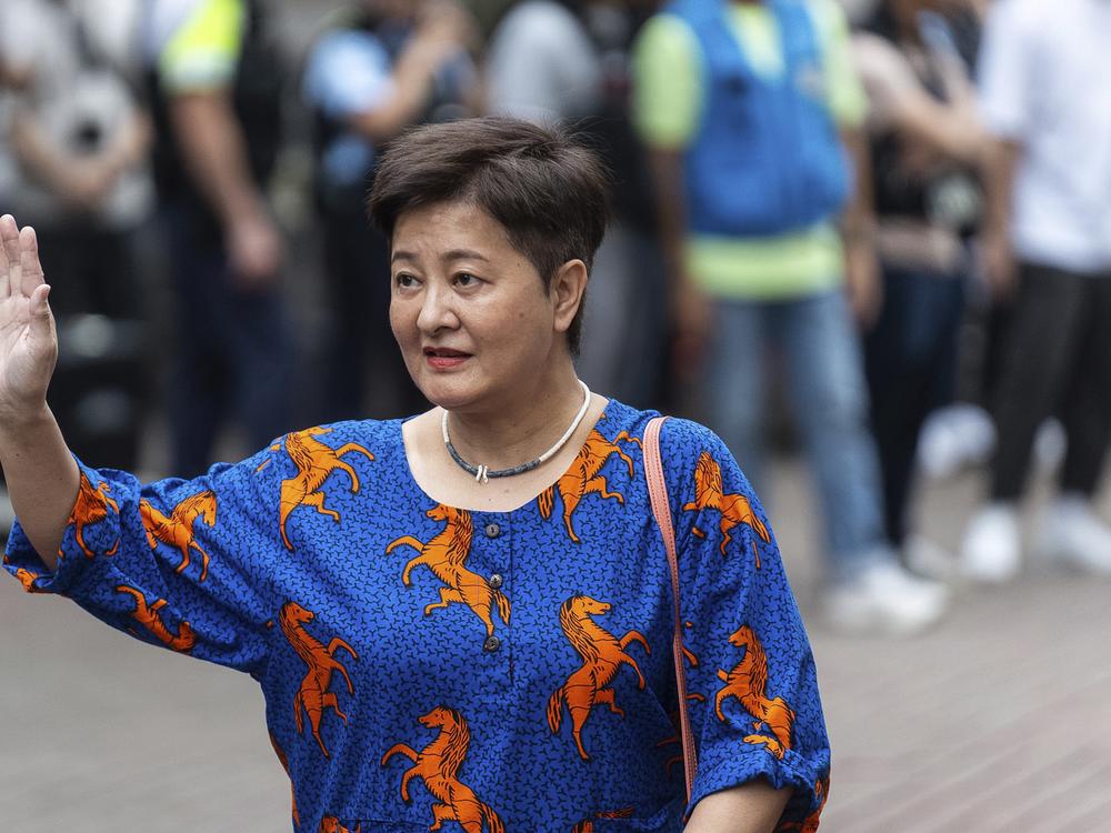 Helena Wong, a former pro-democracy lawmaker, arrives at the West Kowloon Magistrates' Courts in Hong Kong on Thursday.
