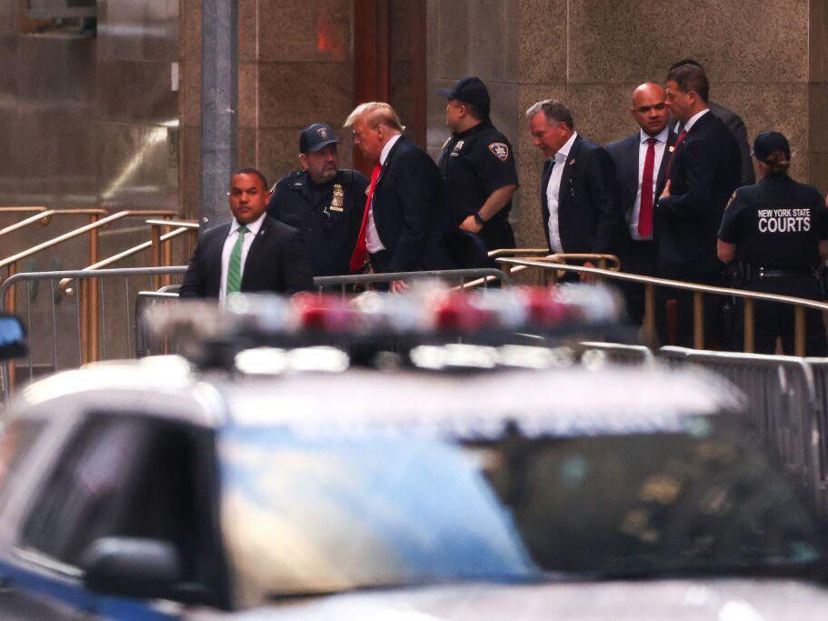 Former President Donald Trump leaves Manhattan Criminal Court in New York City at the end of the day's proceedings Tuesday during his criminal trial for allegedly covering up hush money payments. 