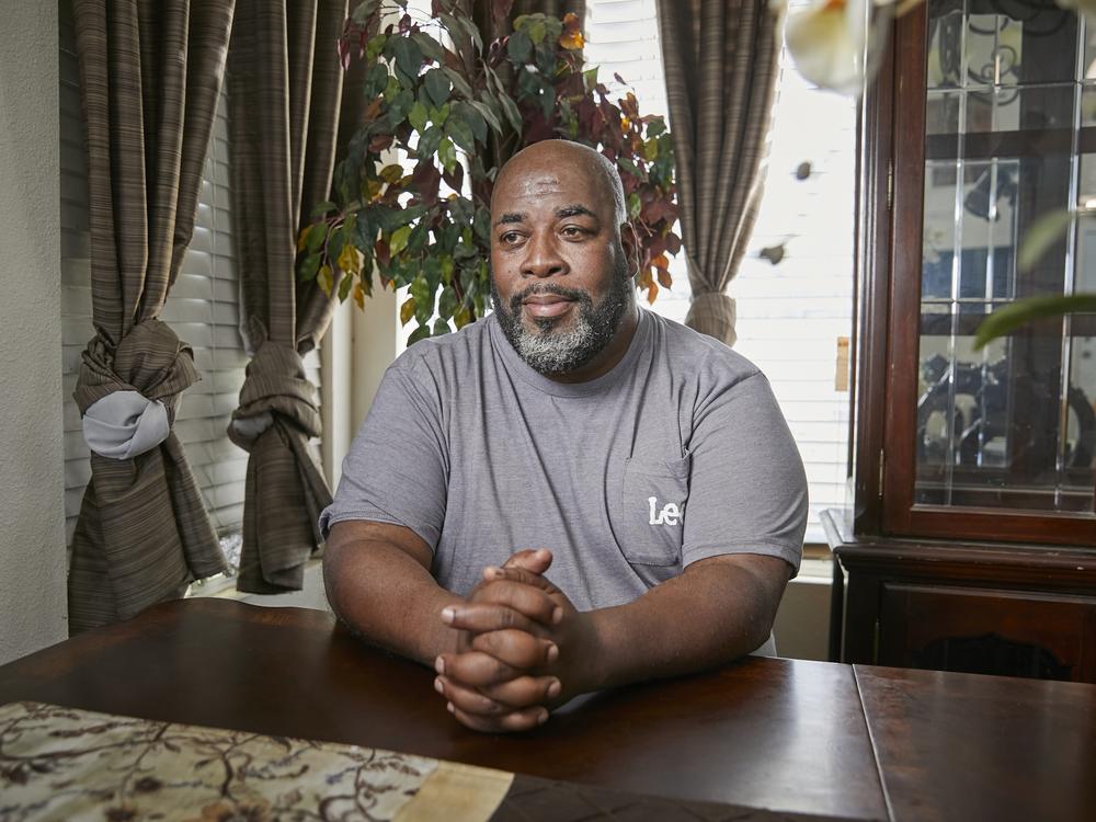 Wymon Johnson, poses for a portrait at his residence in Bakersfield, Calif. Johnson is currently renting a room from a friend while he is waiting for long term housing through the Kern County Housing Authority. 
