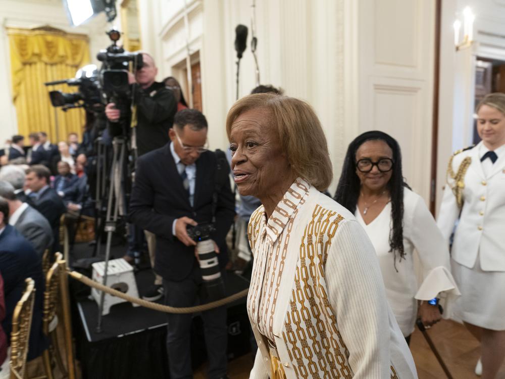 Former first lady Michelle Obama's mother Marian Robinson arrives for a ceremony at the White House in 2022. Robinson, who moved with the first family to the White House when son-in-law Barack Obama was elected president, has died, according to an announcement by Michelle Obama and other family members.