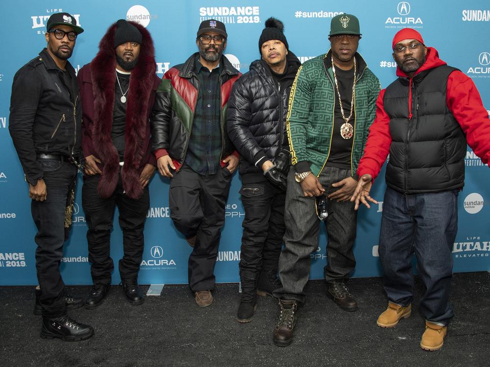 From left, Wu-Tang Clan members RZA, Ghostface Killah, director Sacha Jenkins and Wu-Tang Clan members U-God, Cappadonna and Masta Killa pose at the premiere of 